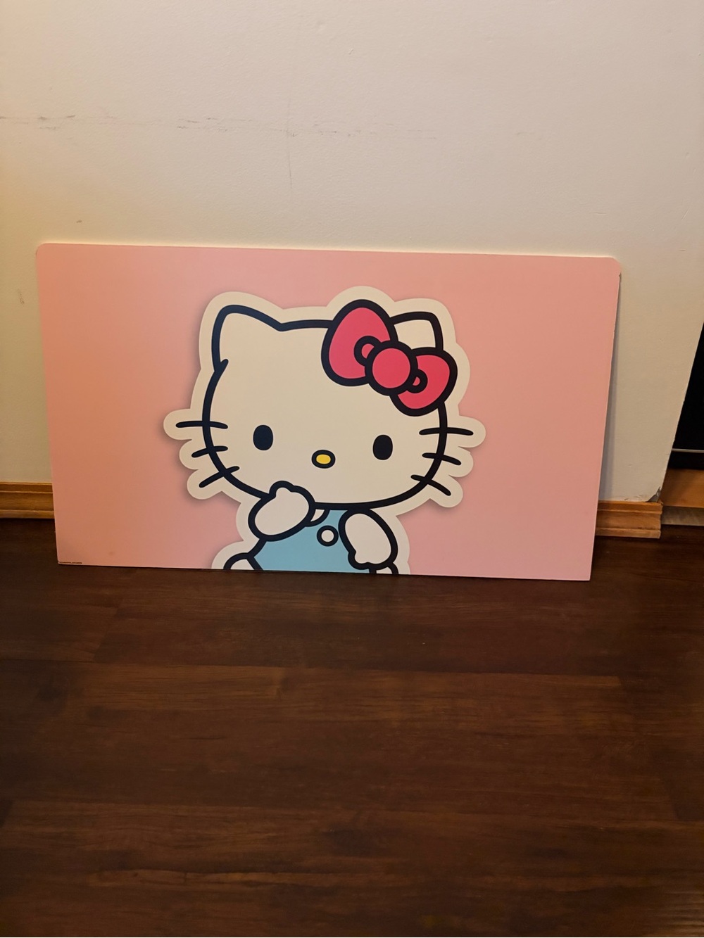 Hello Kitty Pink Panel with Blue Outfit and Red Bow